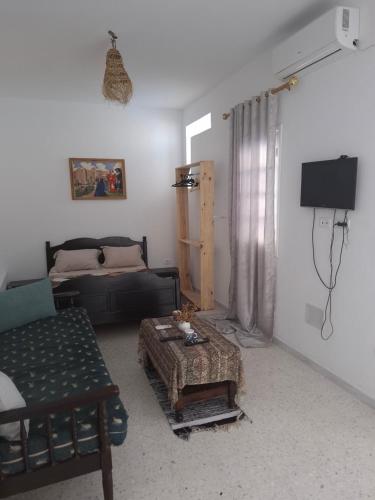 TV a/nebo společenská místnost v ubytování Casa Di Médina