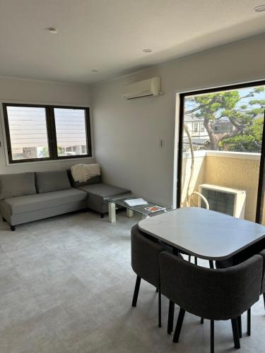 Χώρος καθιστικού στο Guest House Chigasaki