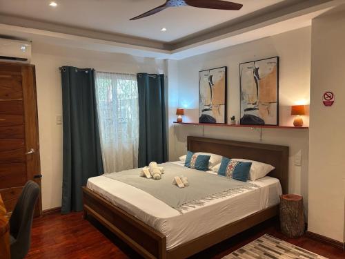 Ένα ή περισσότερα κρεβάτια σε δωμάτιο στο Spacious 2 Puntakana apartelle