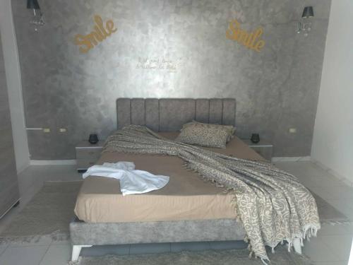 Ένα ή περισσότερα κρεβάτια σε δωμάτιο στο Villa Andreea Paradise