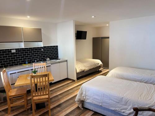 Postel nebo postele na pokoji v ubytování Itzel