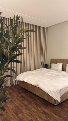 Ένα ή περισσότερα κρεβάτια σε δωμάτιο στο استديو درب الحرمين