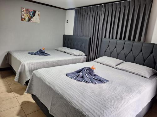 Postel nebo postele na pokoji v ubytování Casa Lapa Herradura