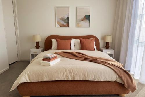 Ένα ή περισσότερα κρεβάτια σε δωμάτιο στο The Retreat at St Andrews Beach Golf Course