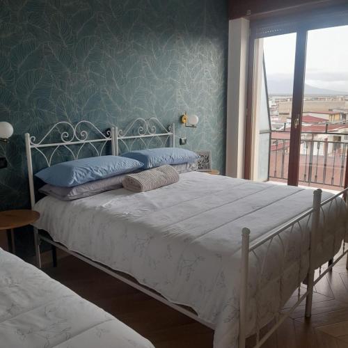 Postel nebo postele na pokoji v ubytování B&B La Rotonda