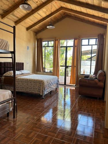 Giường trong phòng chung tại Tikaaaj House Ideal para 3 o 4 personas