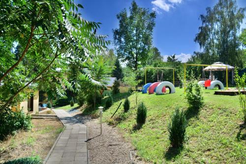 a park with a playground at Areal Hradišek in Klobouky u Brna