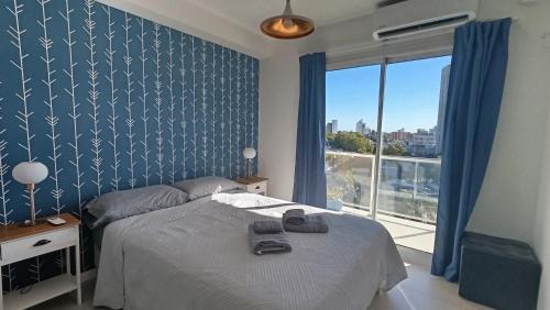 Postel nebo postele na pokoji v ubytování Apart Alameda