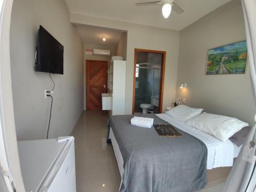 Postel nebo postele na pokoji v ubytování Pousada Solari