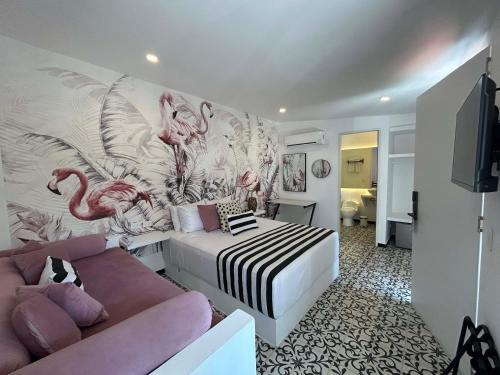 Postel nebo postele na pokoji v ubytování Casa Verde Boutique Hotel