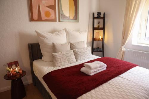 Postel nebo postele na pokoji v ubytování Arden Stay Apartments