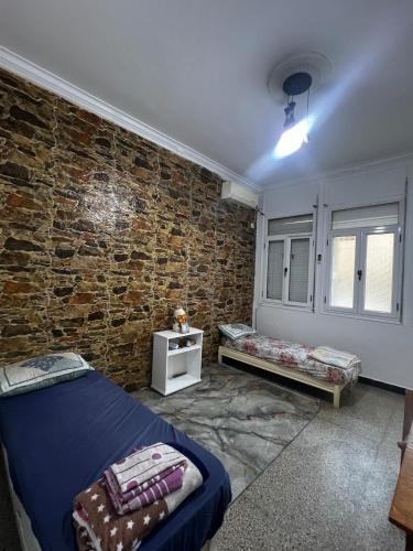 Ένα ή περισσότερα κρεβάτια σε δωμάτιο στο Un studio simple propre sur alger centre