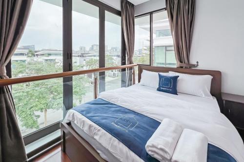 Ένα ή περισσότερα κρεβάτια σε δωμάτιο στο Luxury Villa Putrajaya 16 - Smarthome