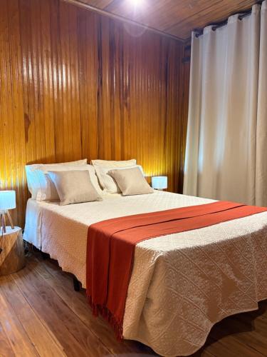 Ένα ή περισσότερα κρεβάτια σε δωμάτιο στο Recanto Bellagio