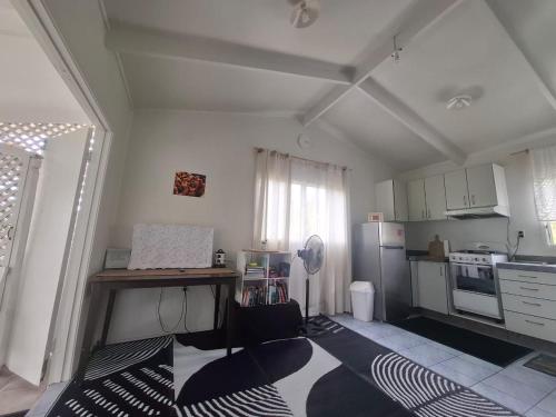 Kuchyň nebo kuchyňský kout v ubytování Raro Palms