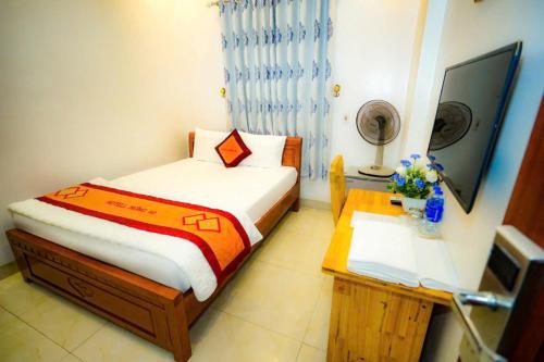 Giường trong phòng chung tại Hồng 68 Motel