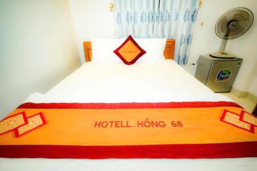 Giường trong phòng chung tại Hồng 68 Motel