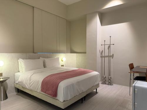 Ένα ή περισσότερα κρεβάτια σε δωμάτιο στο Mr Petter