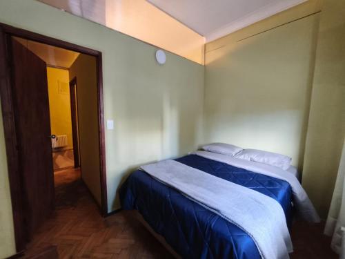 Ein Bett oder Betten in einem Zimmer der Unterkunft Libertador 7 MVD