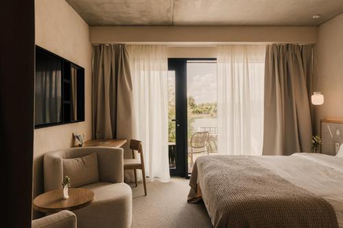 Ліжко або ліжка в номері At Hotel 35