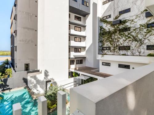 an image of an apartment building with a swimming pool at Avalon Resort Maroochydore in Maroochydore