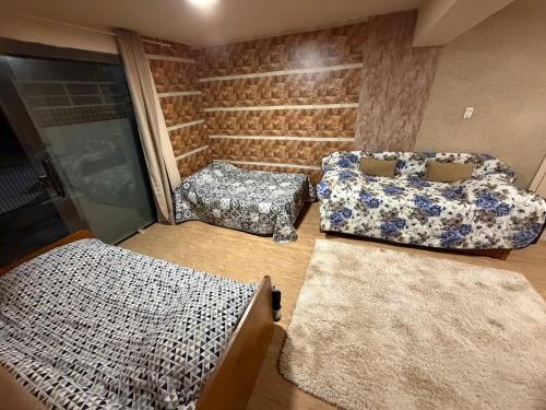 Postel nebo postele na pokoji v ubytování Cantinho do Imperador