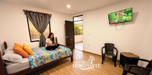 En eller flere senge i et værelse på Finca Hotel Bello Horizonte