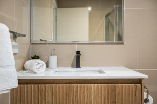 Ένα μπάνιο στο Smart Suites Self Check-in Apartments - Sunnybank Station