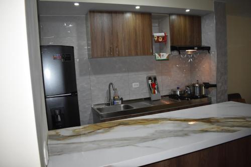 Foto sihtkohas Estación El Salto asuva majutusasutuse Bello Apartamento Familiar en Ibagué galeriist