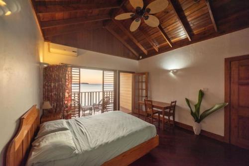 Postel nebo postele na pokoji v ubytování Healing Villas And Resorts