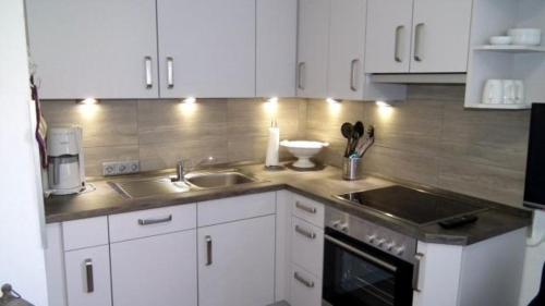 Kuchyň nebo kuchyňský kout v ubytování Wohnung 2 im Haus Wattenblick