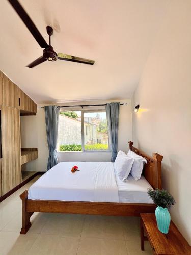 Кровать или кровати в номере North Breeze Nyali Retreat