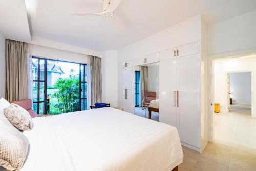 Ένα ή περισσότερα κρεβάτια σε δωμάτιο στο JSD Prime Property-Cherngtalay