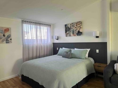 Ένα ή περισσότερα κρεβάτια σε δωμάτιο στο Cosy on Colless