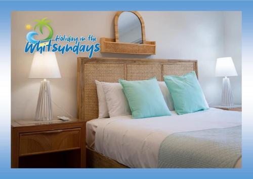 Postel nebo postele na pokoji v ubytování Blue Lagoon Airlie Beach