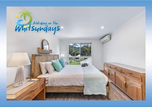 Postel nebo postele na pokoji v ubytování Blue Lagoon Airlie Beach