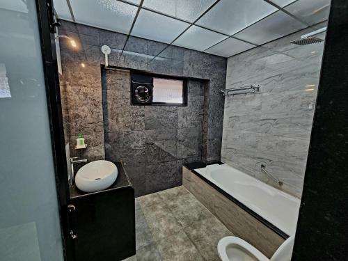 Koupelna v ubytování Kunjwan Resort