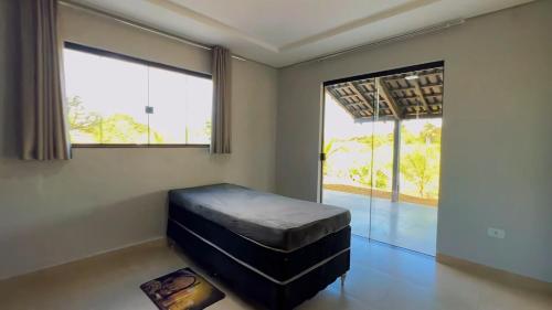 Una cama o camas en una habitación de Recanto Trigueiro, um pedacinho do céu na Terra!