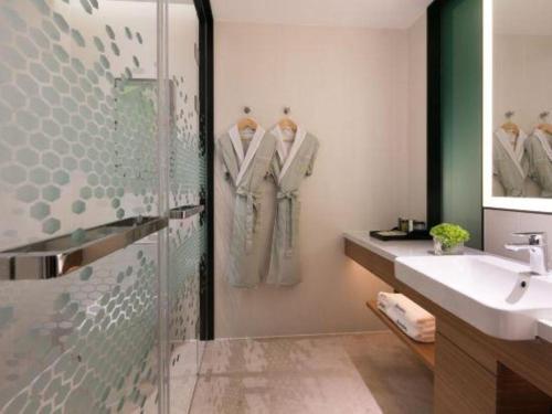 Koupelna v ubytování Hampton by Hilton Suzhou XiangCheng