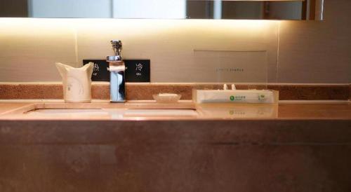 Ένα μπάνιο στο City Comfort Inn Zhanjiang Xuwen Port Wharf Passenger Station