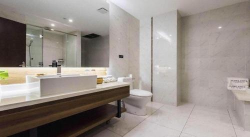 Ένα μπάνιο στο James Joyce Coffetel Jilin Railway Station Fortune Plaza