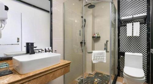 Ένα μπάνιο στο Borrman Hotel Huizhou Danshui High-speed Railway Huiyang Station