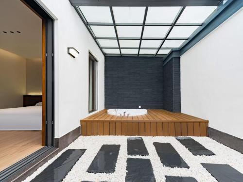 Imagen de la galería de Floral Shemanyue Mountain Homestay, en Tangkou