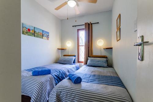 Кровать или кровати в номере The Bridge 38