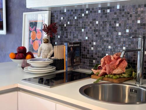 Η κουζίνα ή μικρή κουζίνα στο Berry Home - Biella Duomo