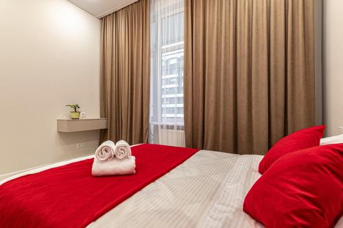 Postel nebo postele na pokoji v ubytování Уютная евродвушка возле Астана Арены