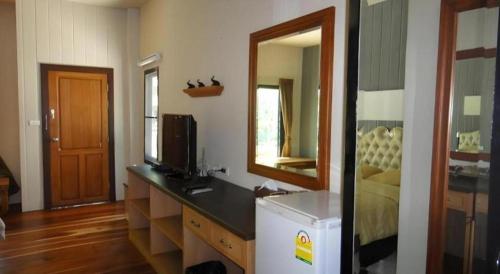 TV a/nebo společenská místnost v ubytování Rai Sai Luang Resort