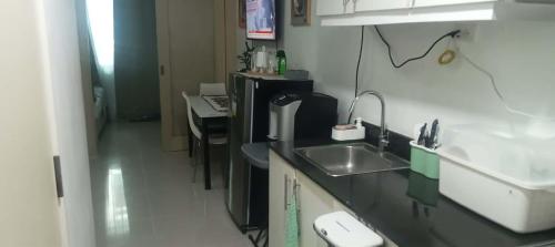 Kuchyň nebo kuchyňský kout v ubytování CHIC ROOM pasay sea residence