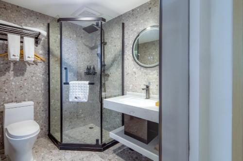 Ένα μπάνιο στο Mushanxun Hotel Changsha Yuelushan Orange Isle Branch