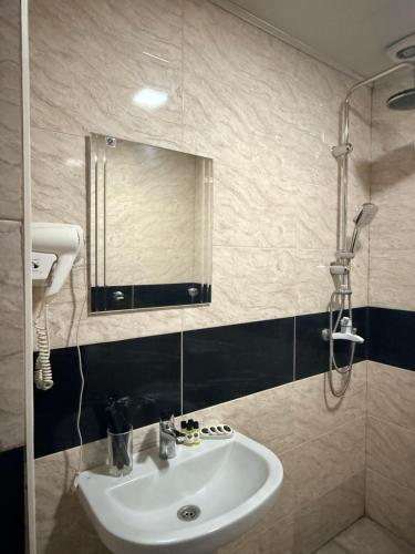 Koupelna v ubytování Apartment Once in Kazbegi